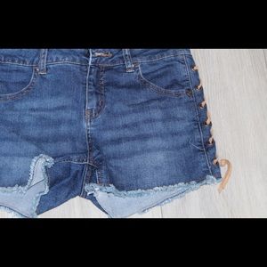 Justice Leather side lace up jean shorts